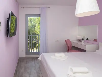 TV i/ili zabavni centar u objektu Apartments Dva Galeba - Standard One Bedroom Apartment with Sea View 203
