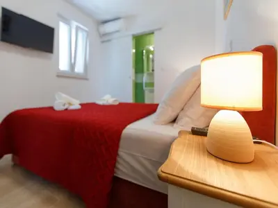 Krevet ili kreveti u jedinici u objektu Villa Balarin - Five Bedroom Holiday Home with Terrace and City View
