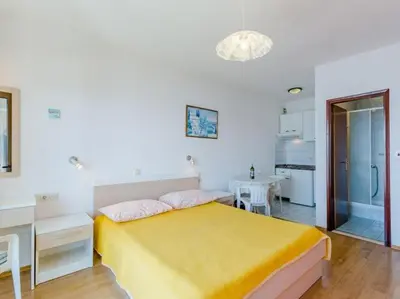 Krevet ili kreveti u jedinici u objektu Villa Kosa - Studio Apartment with Balcony and Sea View