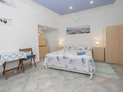 Krevet ili kreveti u jedinici u objektu Apartment Brajki-Three Bedroom Apartment with Balcony and Sea View