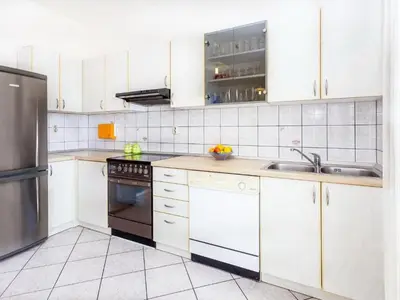 Kuhinja ili čajna kuhinja u objektu Magdales - Comfort Three Bedroom Apartment