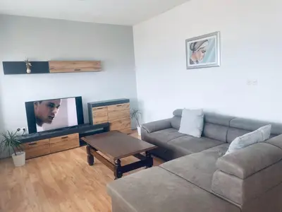 TV i/ili zabavni centar u objektu Magdales - Comfort Three Bedroom Apartment