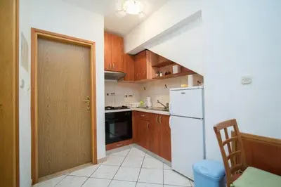 Kuhinja ili čajna kuhinja u objektu Apartments Longo - Standard One Bedroom Apartment with Terrace, A3 - ST