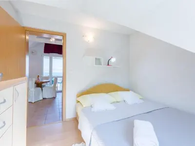 Krevet ili kreveti u jedinici u objektu Villa Stella - Two Bedroom Apartment with Balcony and Sea View Marilena