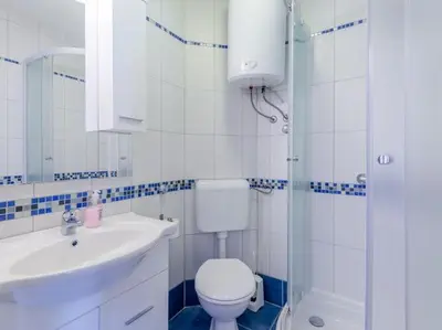 Kupaonica u objektu Villa Stella - Two Bedroom Apartment with Balcony and Sea View Marilena