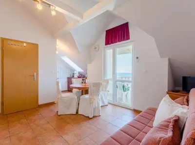 TV i/ili zabavni centar u objektu Villa Stella - Two Bedroom Apartment with Balcony and Sea View Marilena