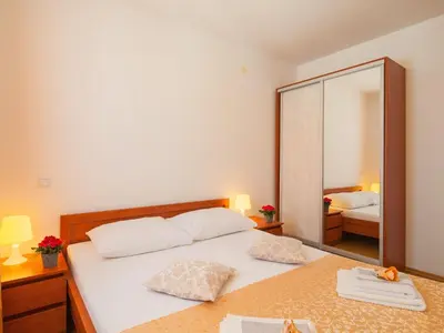 Krevet ili kreveti u jedinici u objektu Apartments Island Beat - One Bedroom Apartment with Balcony and Sea View A1 ST
