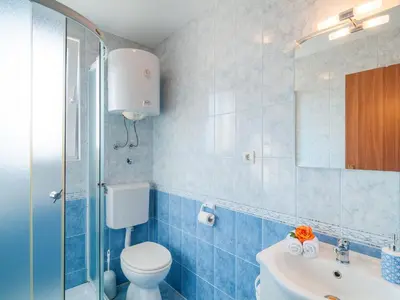 Kupaonica u objektu Apartments Island Beat - One Bedroom Apartment with Balcony and Sea View A1 ST
