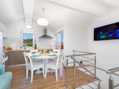 TV i/ili zabavni centar u objektu Holiday home krika -Three Bedroom Home with heated Pool and Jacuzzi