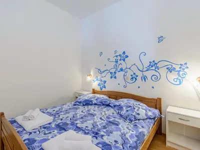 Krevet ili kreveti u jedinici u objektu Apartments Hope Dugi Rat - One-Bedroom Apartment with Terrace and Sea View A2