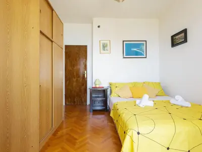 Krevet ili kreveti u jedinici u objektu Apartments Sunrise Duilovo -Three Bedroom Apartment with Sea View Terrace