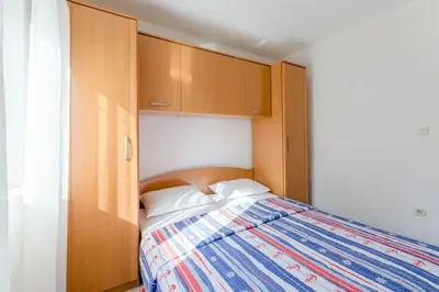 Krevet ili kreveti u jedinici u objektu Villa Stella - Two Bedroom Apartment with Balcony and Sea View Carla