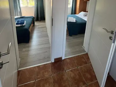 Krevet ili kreveti u jedinici u objektu Villa Stella - Two Bedroom Apartment with Balcony and Sea View Carla