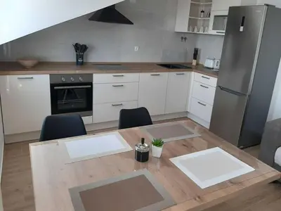 Kuhinja ili čajna kuhinja u objektu Apartments Dobrila - Superior Two Bedroom Apartment with Terrace and sea view - B2