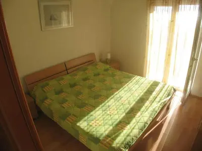 Krevet ili kreveti u jedinici u objektu Apartments Paloc - Standard One-bedroom Apartment with Balcony uti