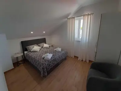 Krevet ili kreveti u jedinici u objektu Apartments Dobrila - One Bedroom Apartment with Terrace and sea view - B1