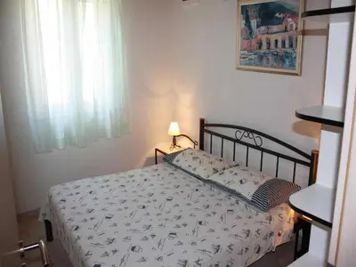 Krevet ili kreveti u jedinici u objektu Apartments Paloc - Bungalow with Garden view