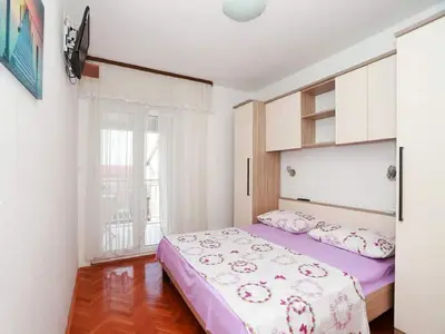 Krevet ili kreveti u jedinici u objektu Apartments Pezo - Studio with Balcony and Sea View