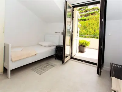 Krevet ili kreveti u jedinici u objektu Apartments & Room Vesna - Superior Studio Apartment with Terrace and Sea View