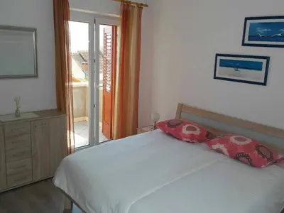 Krevet ili kreveti u jedinici u objektu Apartment Ra i - Two-bedroom Apartment with Balcony and Sea View