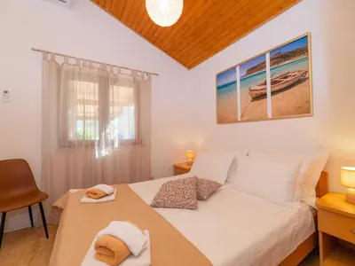 Krevet ili kreveti u jedinici u objektu 4 bedroom villa with swimming pool