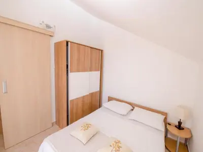 Krevet ili kreveti u jedinici u objektu Apartments Bandalo - One Bedroom Apartment with Sea View