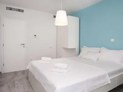 Krevet ili kreveti u jedinici u objektu Apartments Dva Galeba - Premium One Bedroom Apartment with Sea View 103