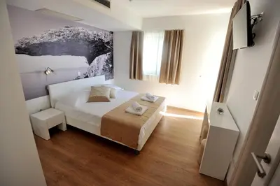 Krevet ili kreveti u jedinici u objektu Apartments Villa Tomislav
