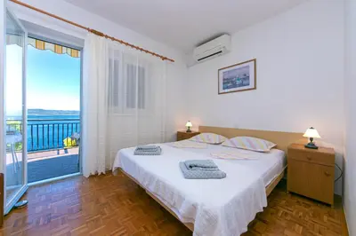 Krevet ili kreveti u jedinici u objektu Apartmani Brela 6