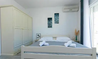 Krevet ili kreveti u jedinici u objektu Apartmani Makarska 10
