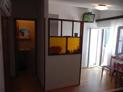 TV i/ili zabavni centar u objektu Apartmani STANIĆ - Coastal Comfort Beach Apartments