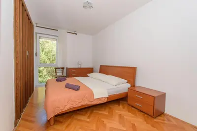 Krevet ili kreveti u jedinici u objektu Sunny Apartment