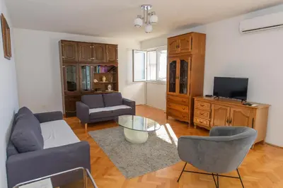 TV i/ili zabavni centar u objektu Sunny Apartment