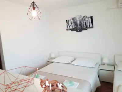 Krevet ili kreveti u jedinici u objektu Apartments Mira