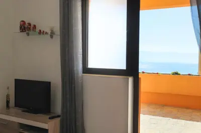 TV i/ili zabavni centar u objektu Apartment Ema