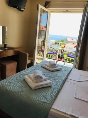 Krevet ili kreveti u jedinici u objektu Palma Promajna Apartments