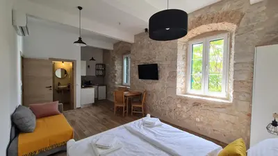 TV i/ili zabavni centar u objektu Calico Apartment's
