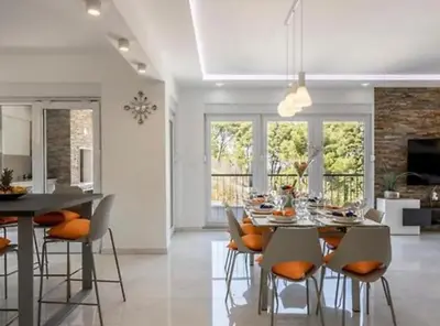 TV i/ili zabavni centar u objektu Modern & Stylish Villa with Private Pool