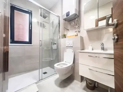 Kupaonica u objektu Apartment Garden Podstrana - 5 minute walk from the beach