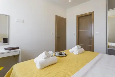 Krevet ili kreveti u jedinici u objektu Apartment in Podstrana-Sv Martin with sea view, balcony, air conditioning, WiFi 4777-3