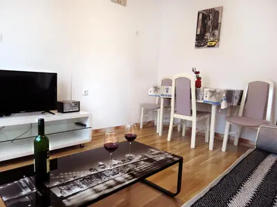TV i/ili zabavni centar u objektu Apartment Jadro