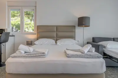 Krevet ili kreveti u jedinici u objektu Deluxe Seaview Studios KENNEDY II