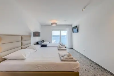 Krevet ili kreveti u jedinici u objektu Deluxe Seaview Studios KENNEDY II