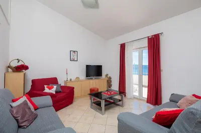 TV i/ili zabavni centar u objektu Amalia Beach Apartment