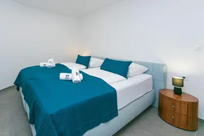 Krevet ili kreveti u jedinici u objektu Apartmani Brela 15 luxury