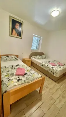 Krevet ili kreveti u jedinici u objektu Apartments Neven