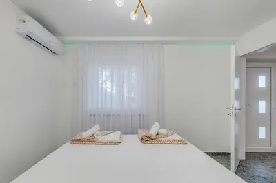 Krevet ili kreveti u jedinici u objektu DeLuxe Seaview Apartment KENNEDY I