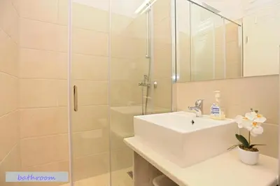 Kupaonica u objektu Duplex Apartment for 10 persons, first row by the sea, Beach House Ana