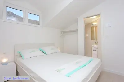 Krevet ili kreveti u jedinici u objektu Duplex Apartment for 10 persons, first row by the sea, Beach House Ana