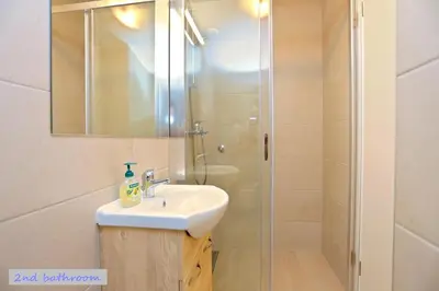 Kupaonica u objektu Duplex Apartment for 10 persons, first row by the sea, Beach House Ana